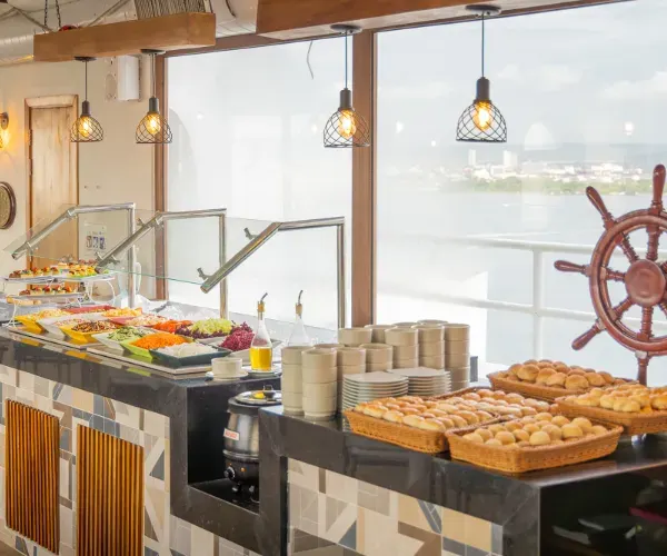 Decameron all inclusive buffet with ocean view resorts Decameron all inclusive buffet with varied dishes, bakery selection and ocean views